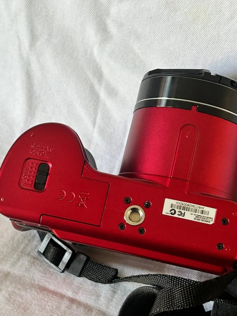 Samsung WB100 Red Digital Camera with Built-in Flash and Strap